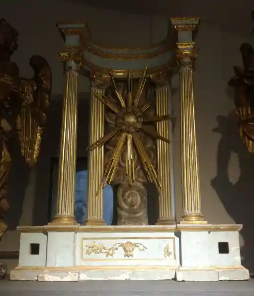 Sun symbol with IHS, monogram of Jesus, in the center, Cathedral Museum and Labrynth of Porsenna